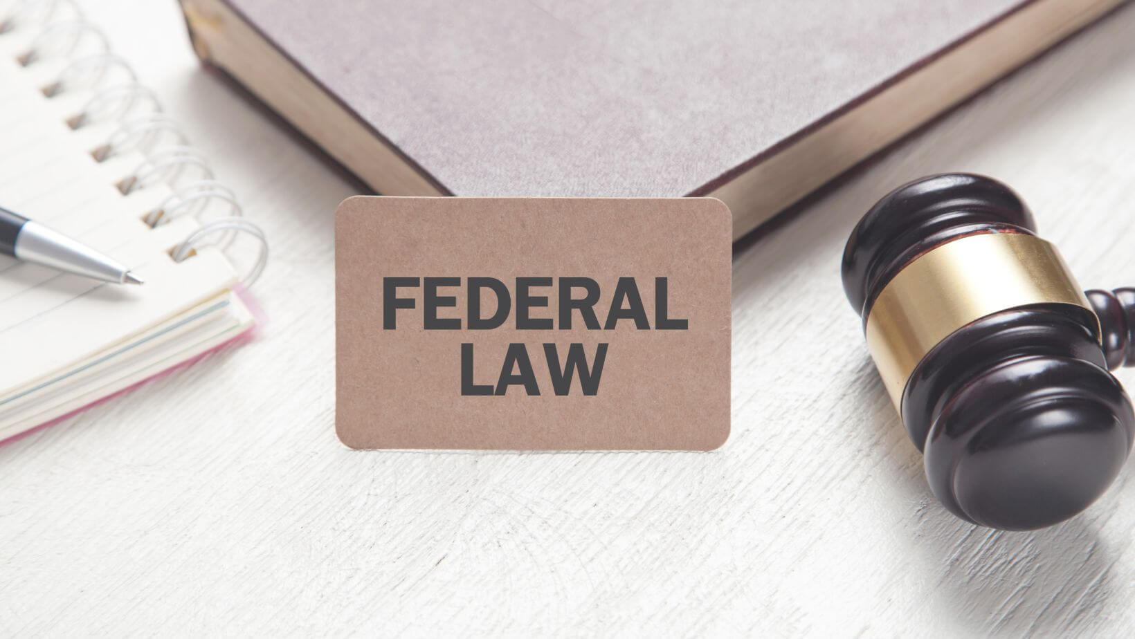 A card with the text Federal Law on it.